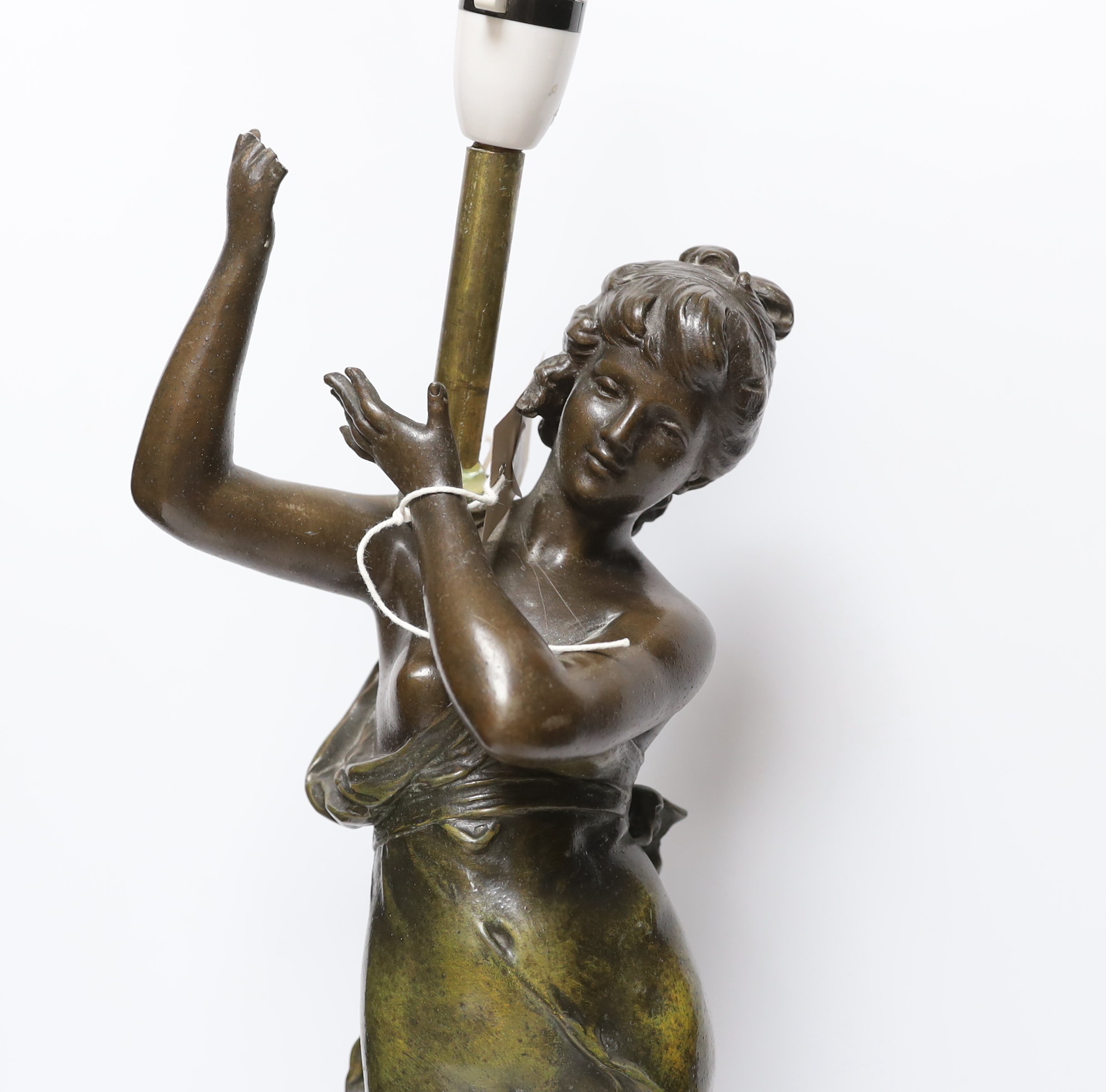 After Auguste Moreau (1834-1917) an Art Nouveau style spelter figural table lamp, applied plaque, 53cm high